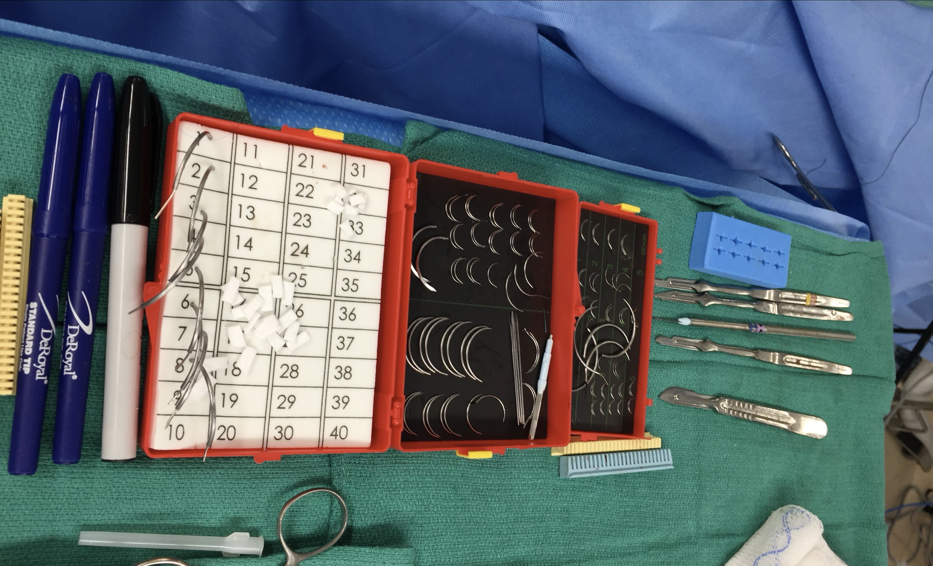 Surgical sharps counting tray with needle count board and instruments